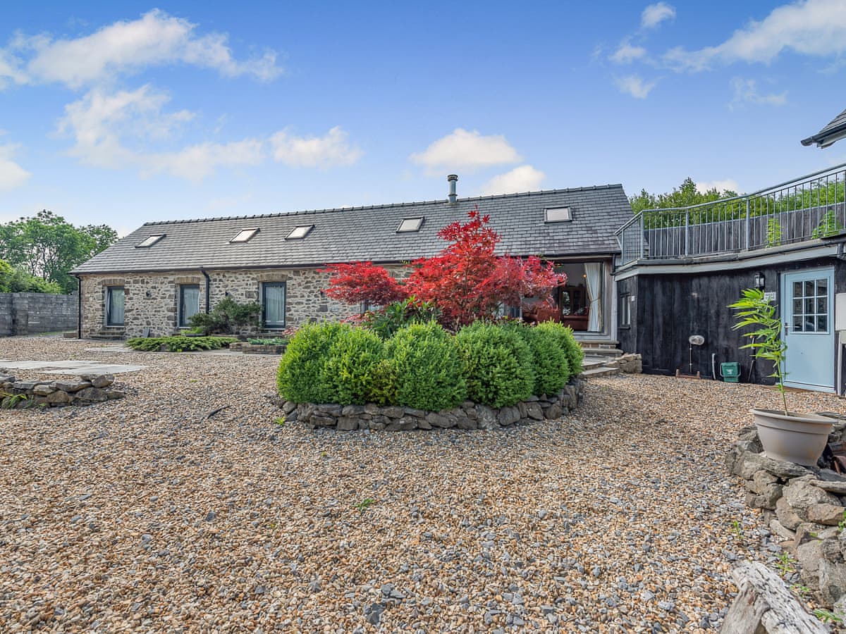 West Barn exterior with countryside views