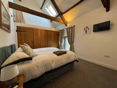 A bedroom under the beams